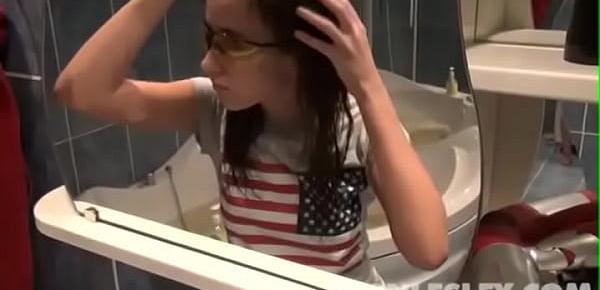  Teen Lesley takes a hot shower to make her more horny